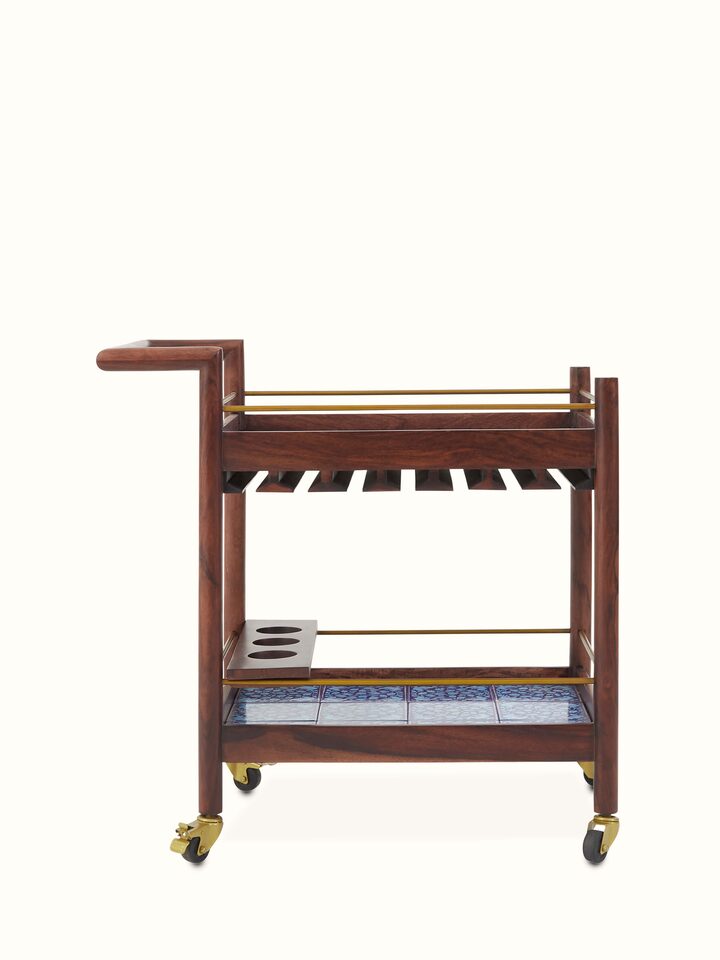 Front view of the Sheesham wood bar trolley featuring intricate blue pottery detailing, showcasing its elegant design and craftsmanship