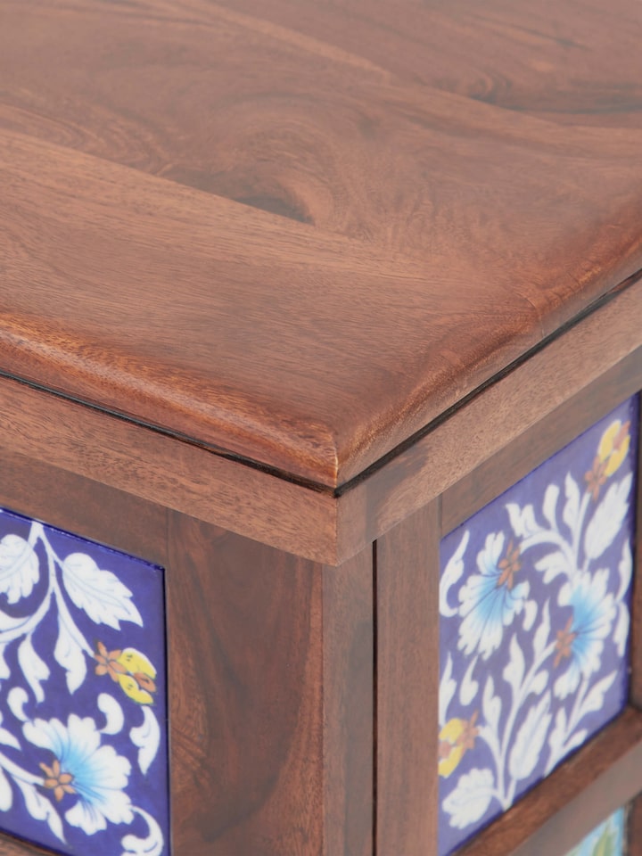 Sheesham wood trunk with blue pottery inlay, showing the side details and unique design elements of the trunk.