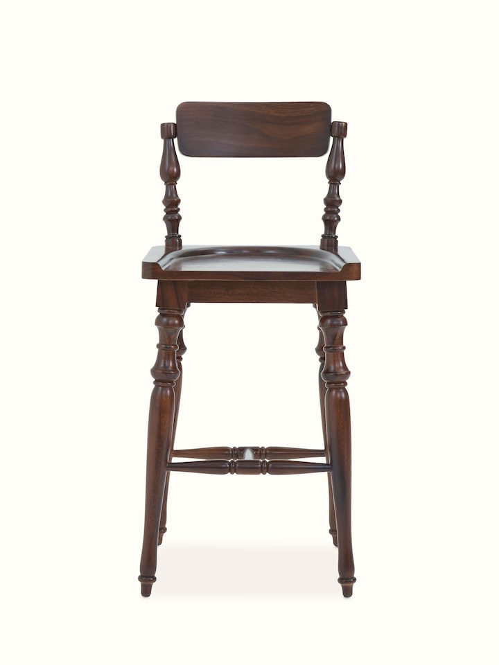 Front view of Sheesham wood bar stool, highlighting its sleek design and natural wood finish.