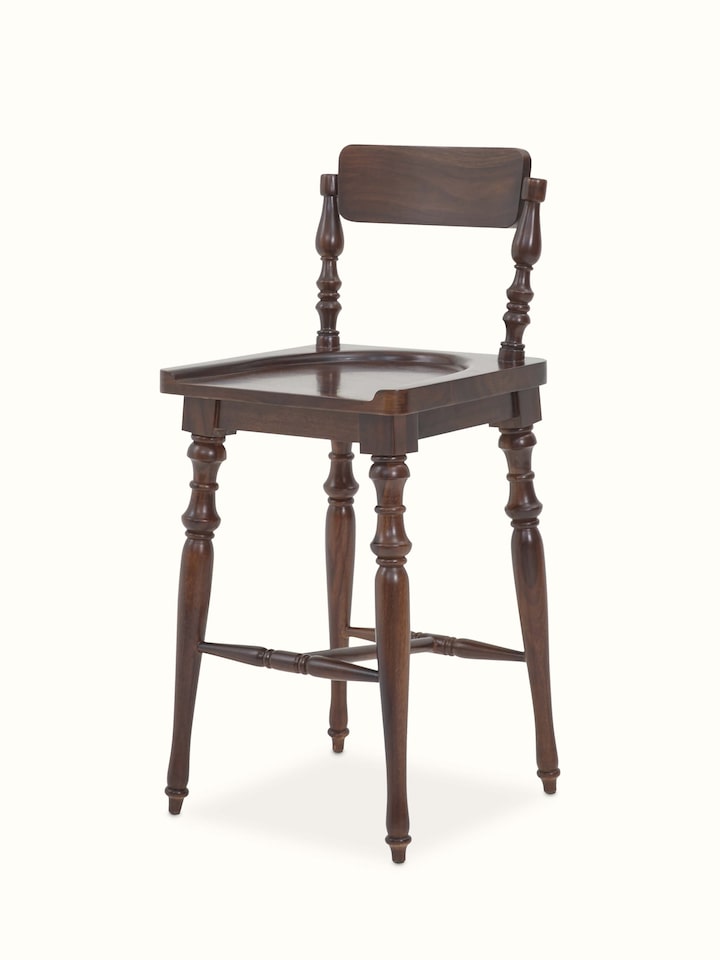 Close-up of the Sheesham wood bar stool seat, emphasizing the rich grain and finish of the wood.