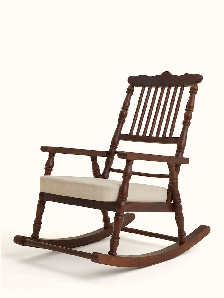 Angled view of the Upholstered Sheesham Wood Rocking Chair