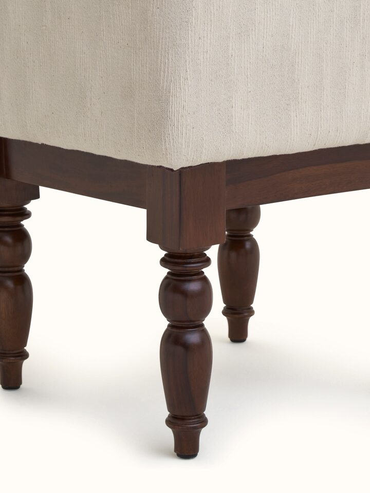 Top view of the upholstered Sheesham wood octagonal ottoman, showcasing the cushioned surface and octagonal shape.