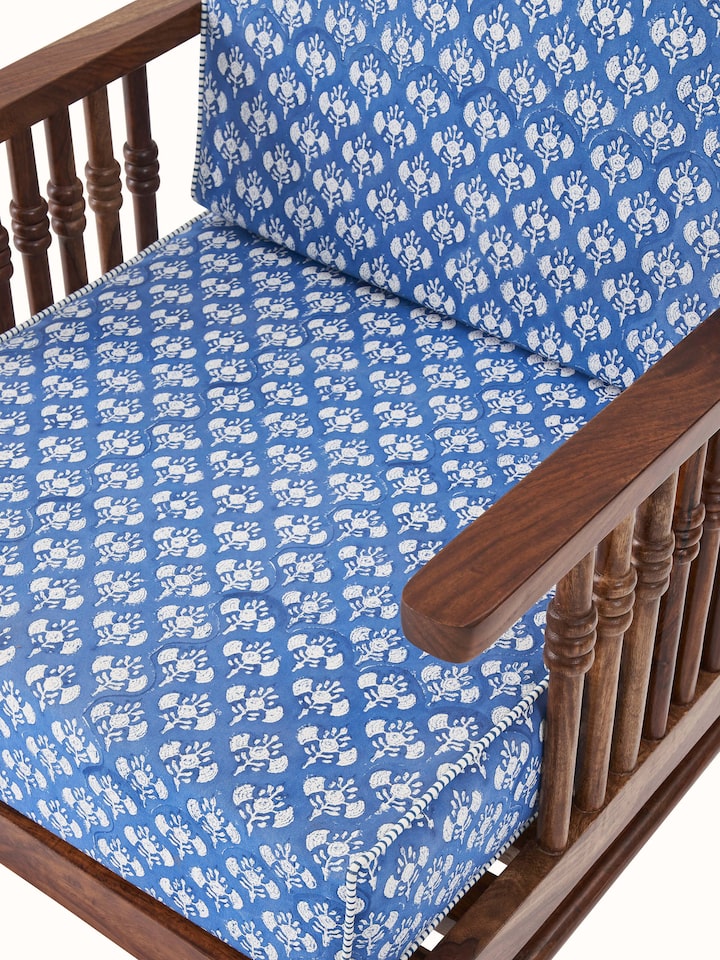 Back view of Upholstered Sheesham Wood Sanganeri Block Print Lounge Chair emphasizing its beautiful backrest and premium upholstery.
