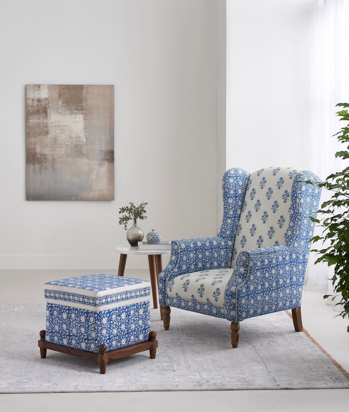Side view of Upholstered Sheesham Wood Sanganeri Block Print Pouffe, highlighting the craftsmanship of the Sheesham wood and block print upholstery