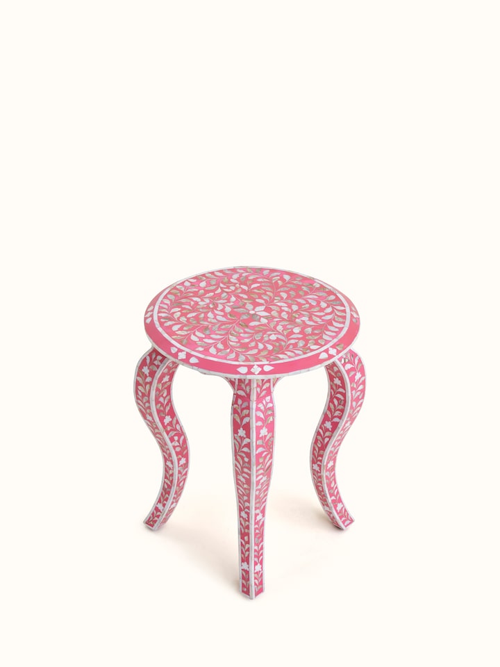 Close-up of the mother-of-pearl inlay on the side table, emphasizing the delicate and detailed work of the inlaid design