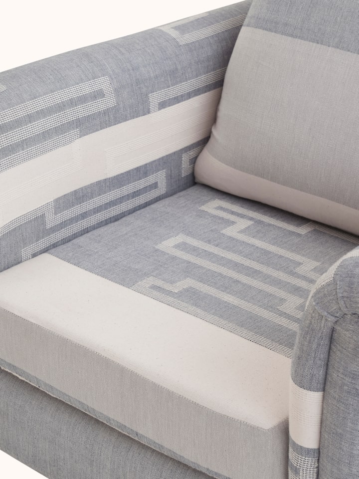 Detailed view of Sheesham Wood Bawan Buti Lounge Chair, showing the texture and finish of the wood