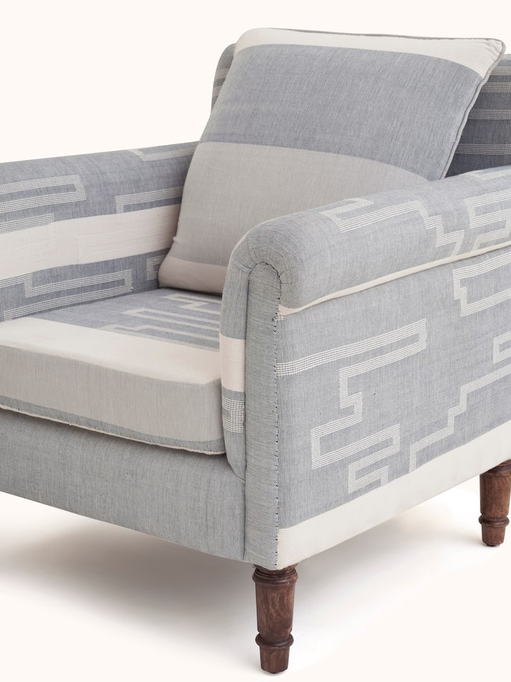 View of Sheesham Wood Bawan Buti Lounge Chair from the back, showing the solid construction and design features