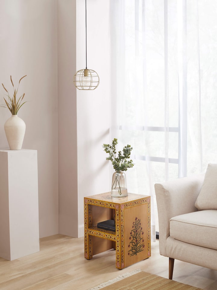 Side view of miniature painted end table, highlighting the artistic craftsmanship and vibrant colors.