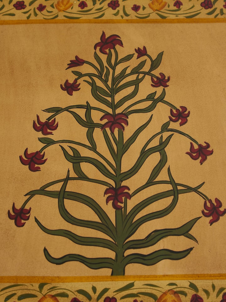 Close-up of the base of the miniature painted end table, highlighting the craftsmanship and attention to detail.