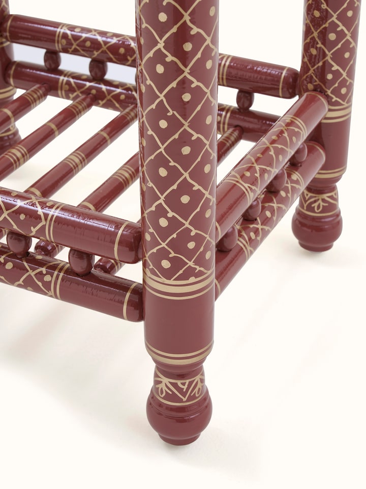 Rear view of the teak wood Sankheda magazine rack, showing the structural design and finish