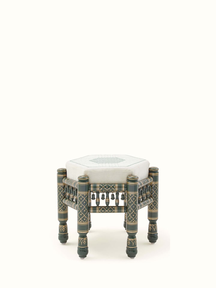 Front view of Upholstered teak wood Sankheda octagonal pouffe showcasing traditional design