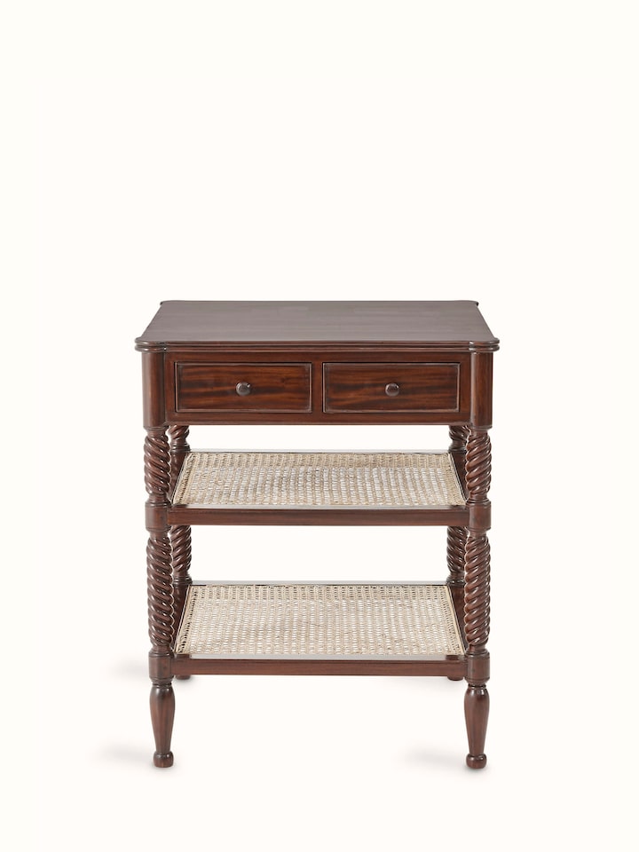 Front view of the mahogany wood and cane bedside table, featuring a sleek design and detailed cane work.