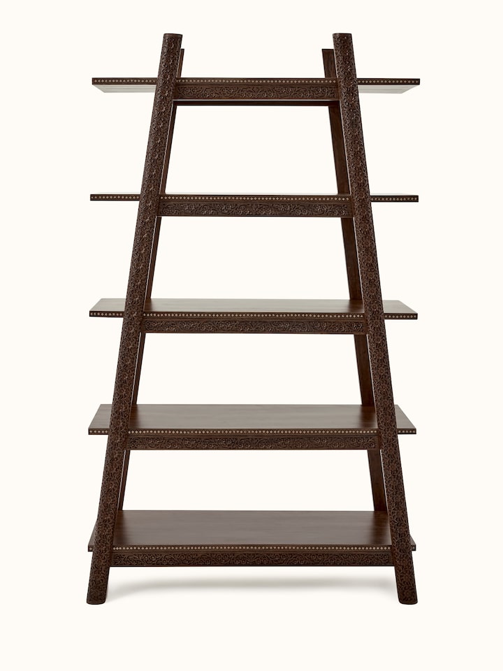 Front view of carved sheesham wood bookshelf, showcasing intricate woodwork and spacious shelves