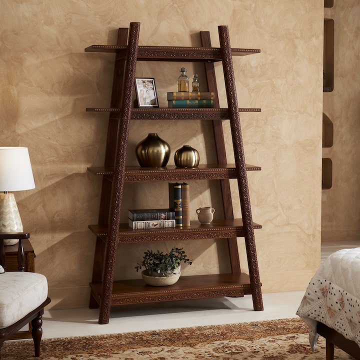 Side view of carved sheesham wood bookshelf, highlighting detailed craftsmanship and sturdy design