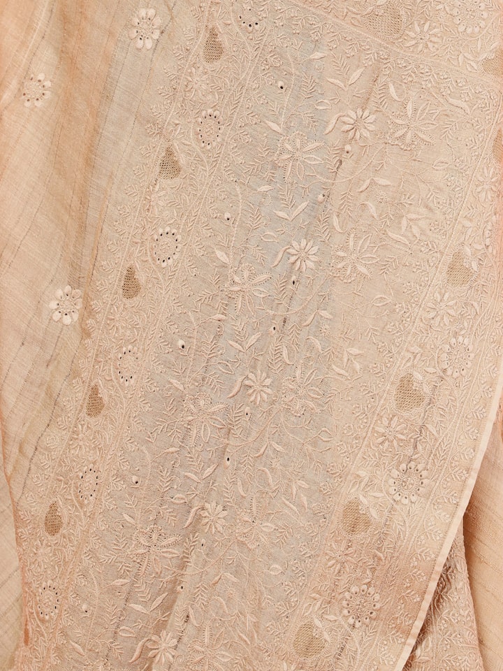Another angle capturing the full, luxurious spread of this statement shawl.