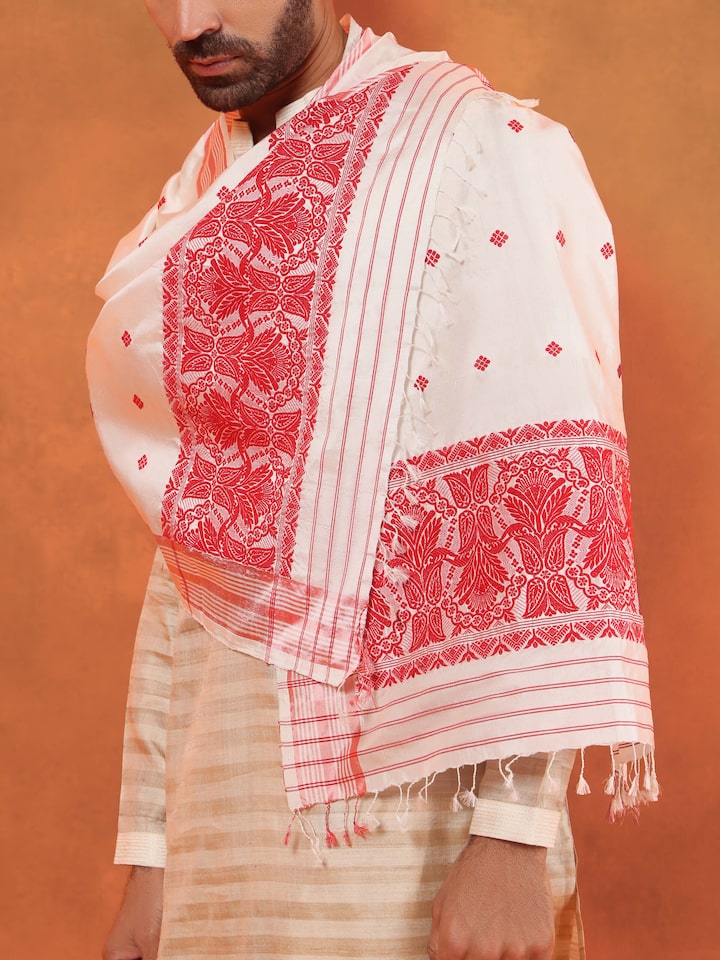 White mulberry silk stole draped elegantly on a mannequin, showcasing its lightweight and delicate fabric.