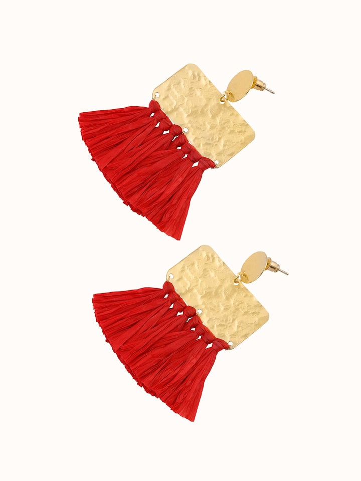 Angled view of Raffia Fibre Drop Earrings showcasing their stylish and unique design.