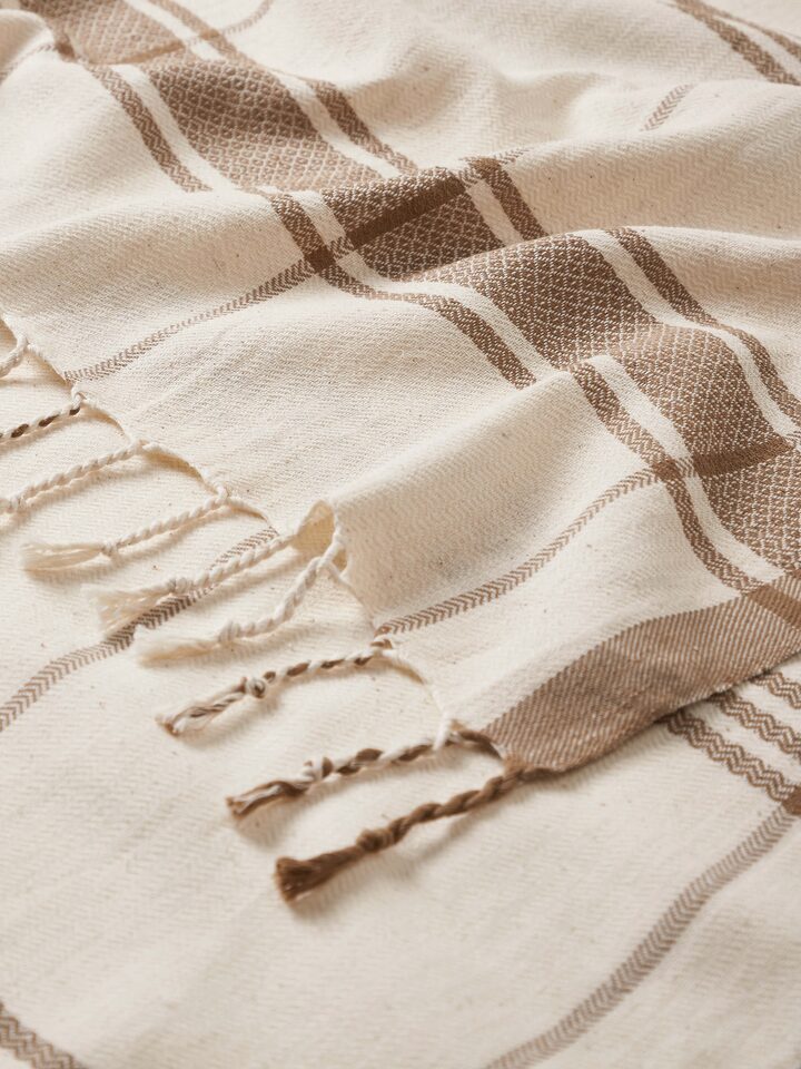 Detailed view of Sarvika Brown Checks Cotton Bath Towel (L), showcasing the texture and checkered design.
