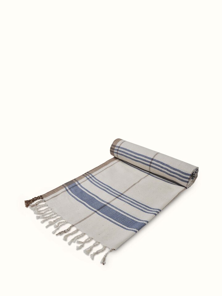 Detailed view of Sarvika blue checks cotton bath towel (M) focusing on the fabric and pattern.