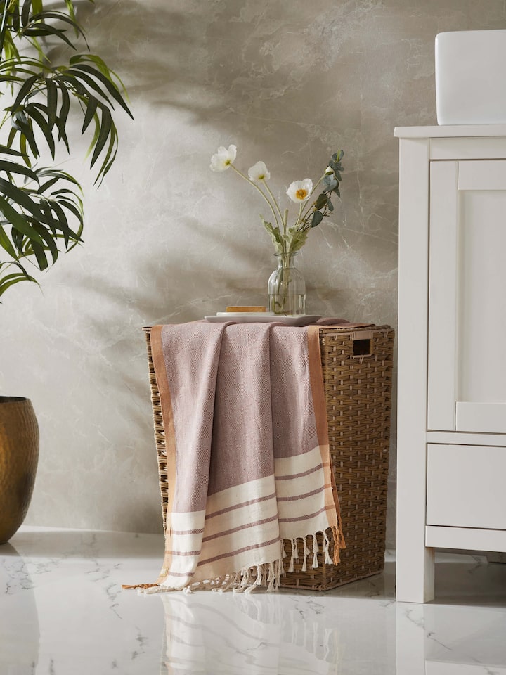 Side view of Samitha red stripe cotton bath towel (M) highlighting the texture and design of the red stripes.