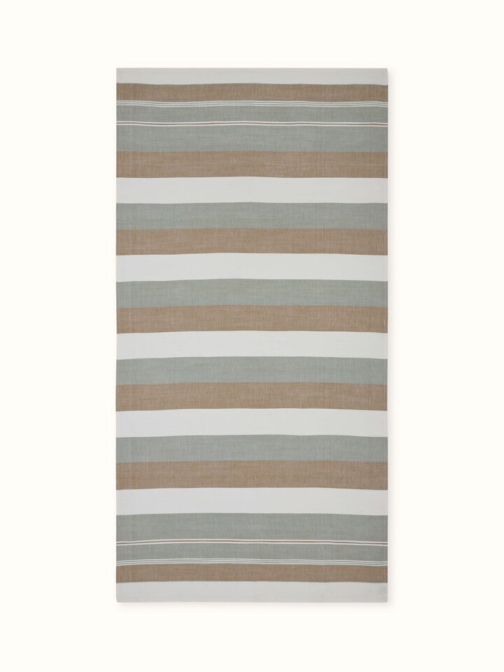 Front view of a green cotton striped bath towel, showcasing the soft texture and vibrant green stripes.