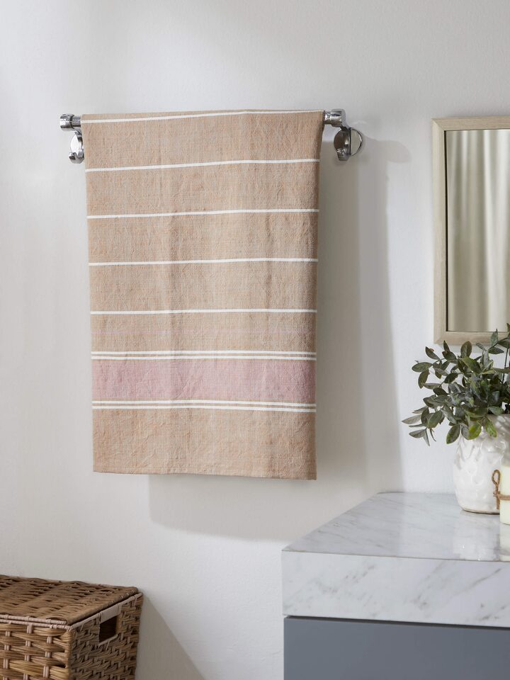 Side view of Samistha brown stripe cotton bath towel (M) highlighting the stripe pattern and texture.