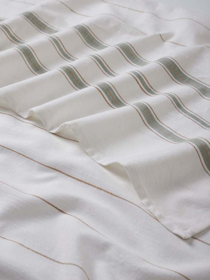 Detailed view of Adrita Green Stripe Cotton Bath Towel (M), focusing on the fabric's quality and stripe design.