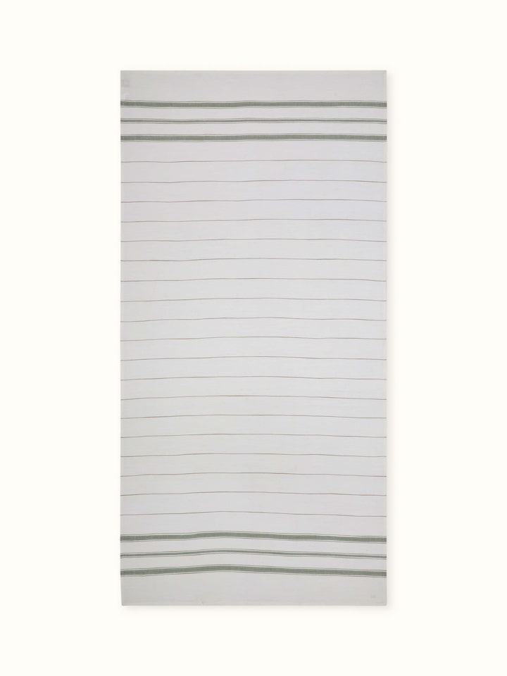 Full view of Adrita green cotton bath towel featuring a striped design