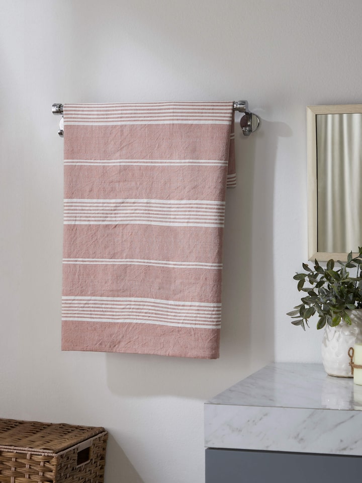 Side view of Simhi Pink Stripe Cotton Bath Towel (M), showcasing its pink and white stripe pattern.