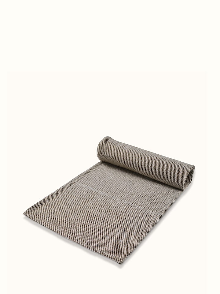 Side view of Shikara green chambray cotton bath towel (M) showing the thickness and edge design