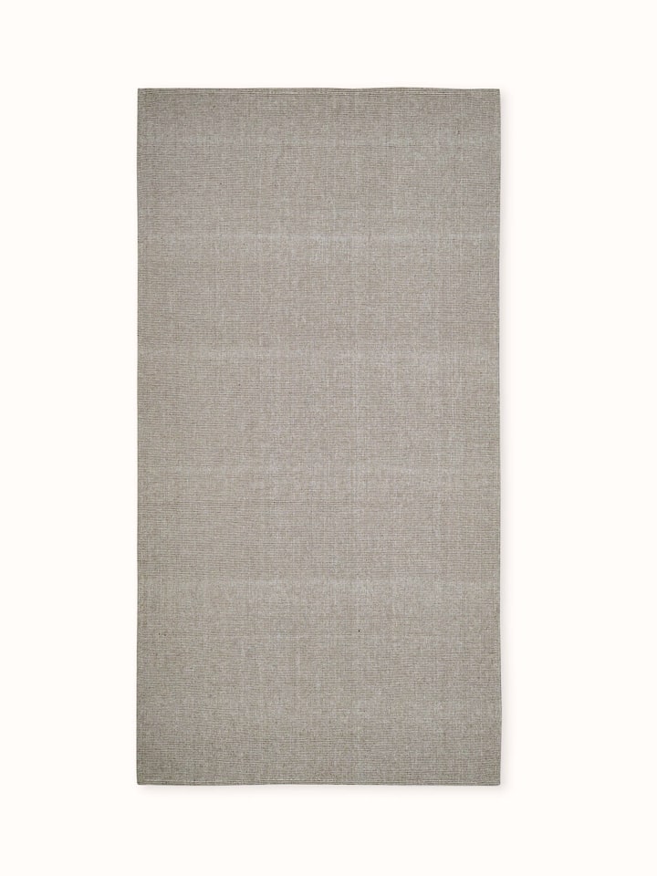 Full view of Shikara green chambray cotton bath towel (L) showing its green chambray fabric and large size