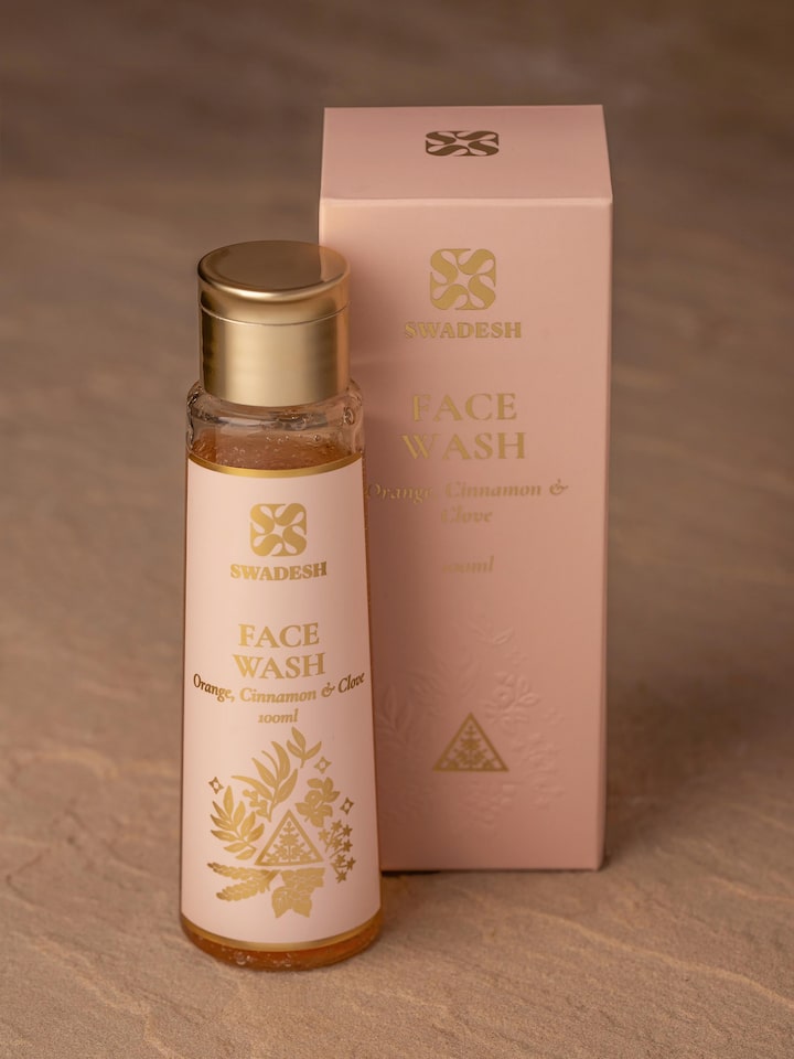 Back view of Face Wash Orange, Cinnamon & Clove bottle showing ingredients list