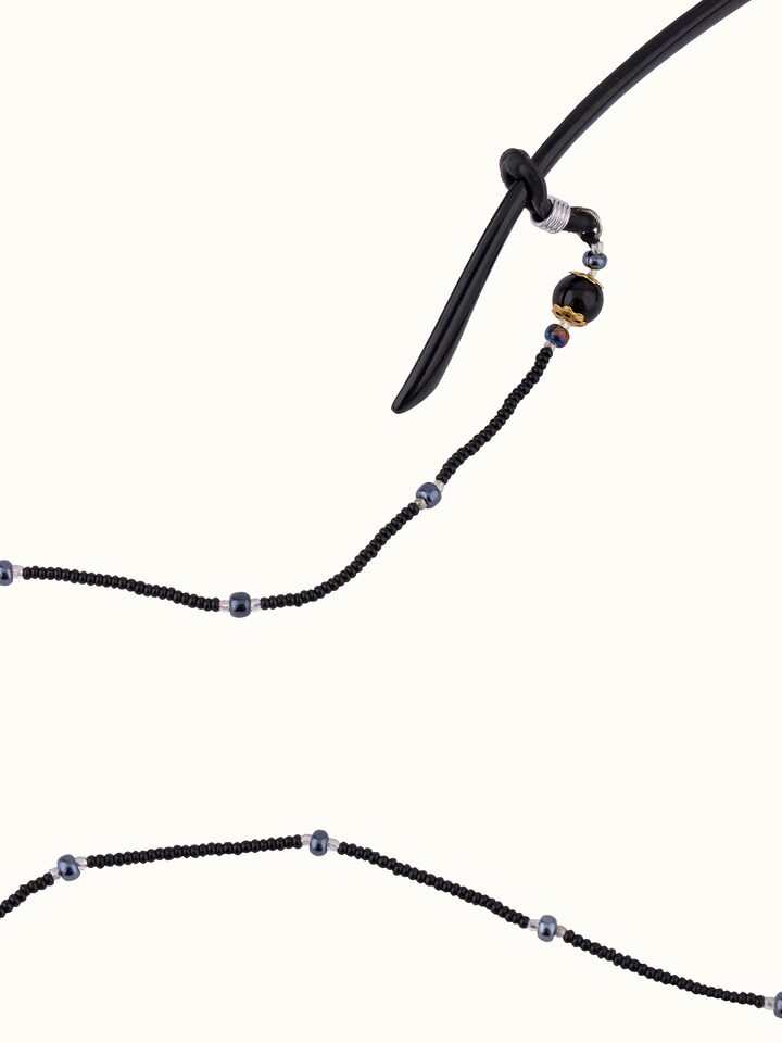 Overhead view of Glass Bead Lanyard emphasizing the colorful bead arrangement and elegant design.