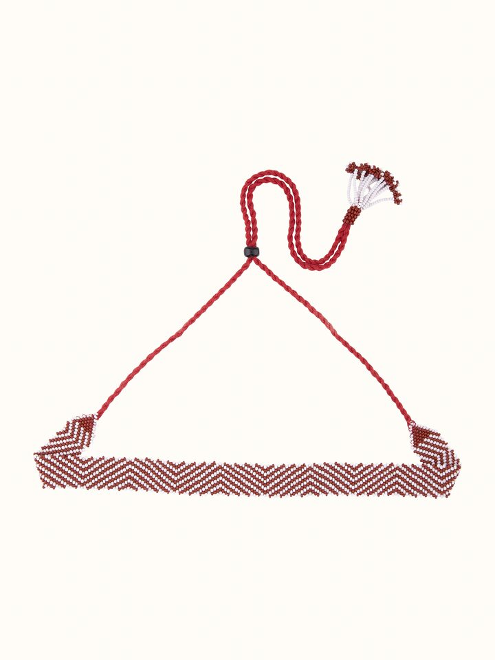 Front view of handcrafted long necklace featuring elegant design and detailed craftsmanship.
