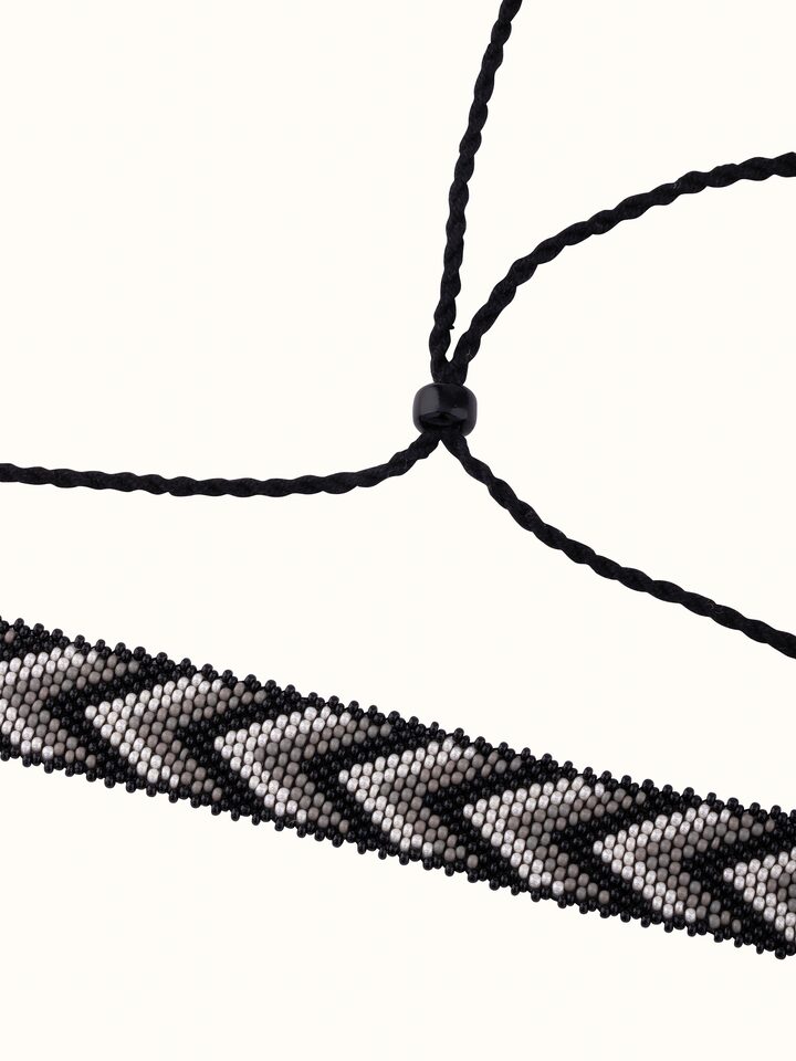 Angled view of Glass bead choker showcasing colorful beads and detailed design