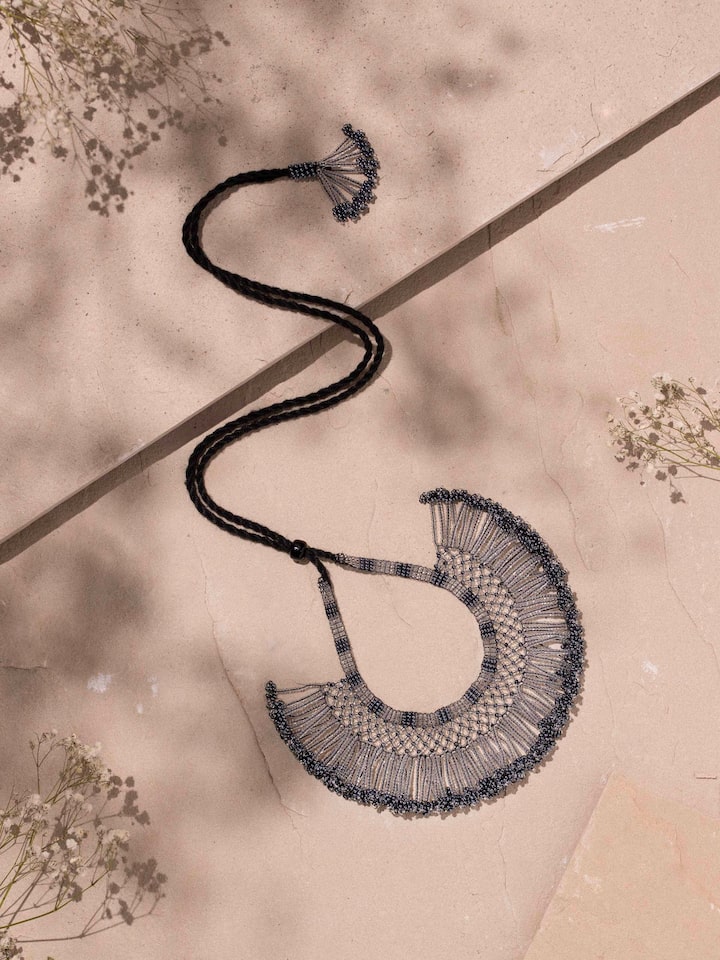 Styled detail view of Glass Bead Choker worn around the neck, shown in an alternate styled shot