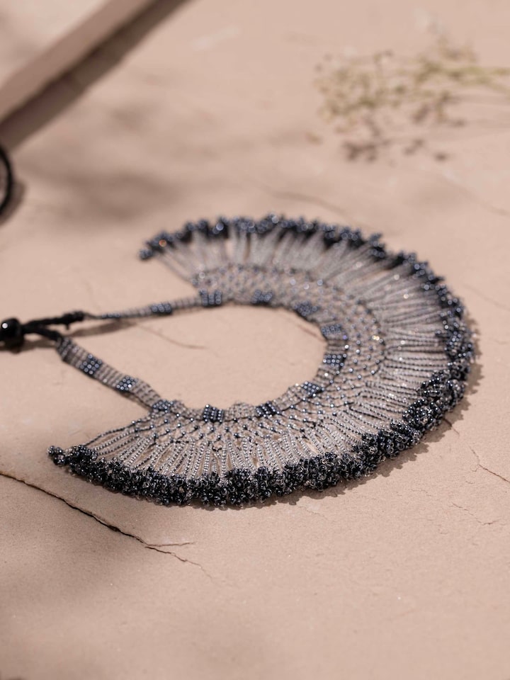 Detail view of Glass Bead Choker highlighting the stone setting and metalwork detail
