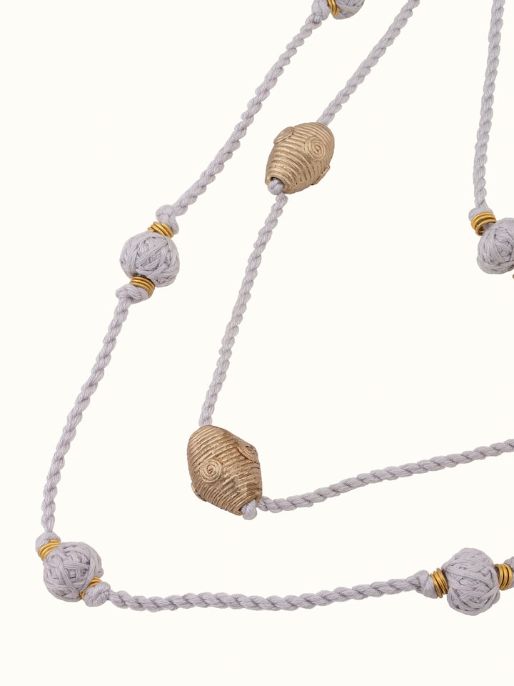 Close-up of Dhokra long necklace showing unique design