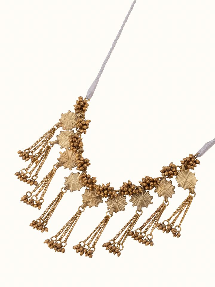 Back view of Dhokra Collar Necklace focusing on the clasp and overall design of the traditional necklace.