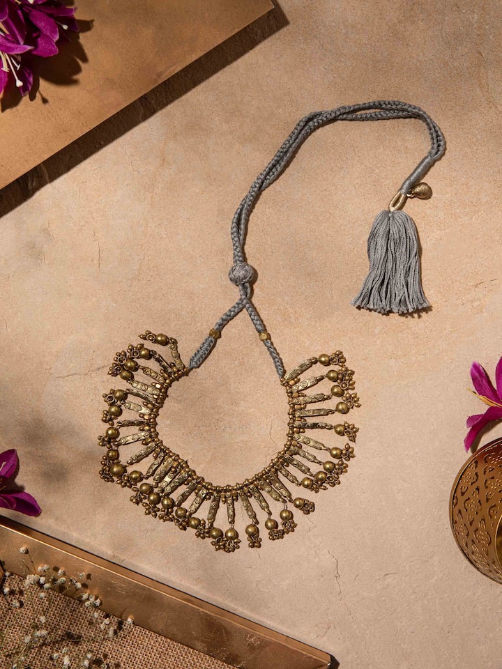 Styled detail view of Dhokra Choker worn around the neck, shown in an alternate styled shot