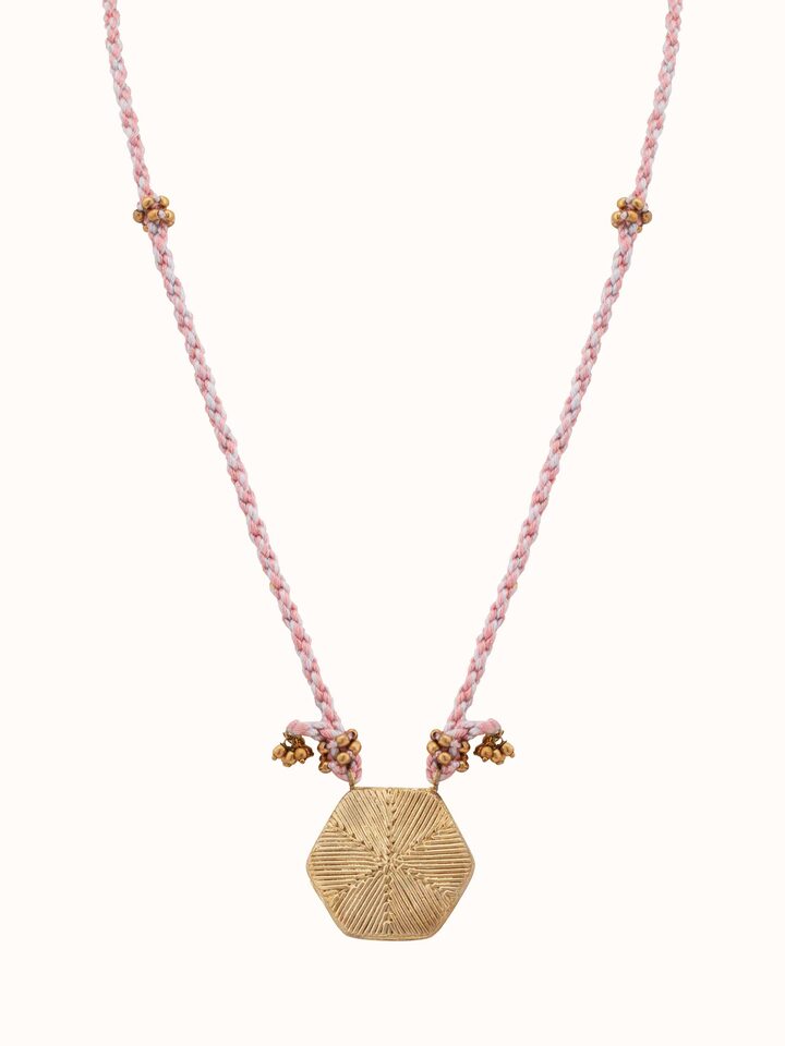 Front view of Dhokra pendant and chain featuring intricate metalwork and traditional design.
