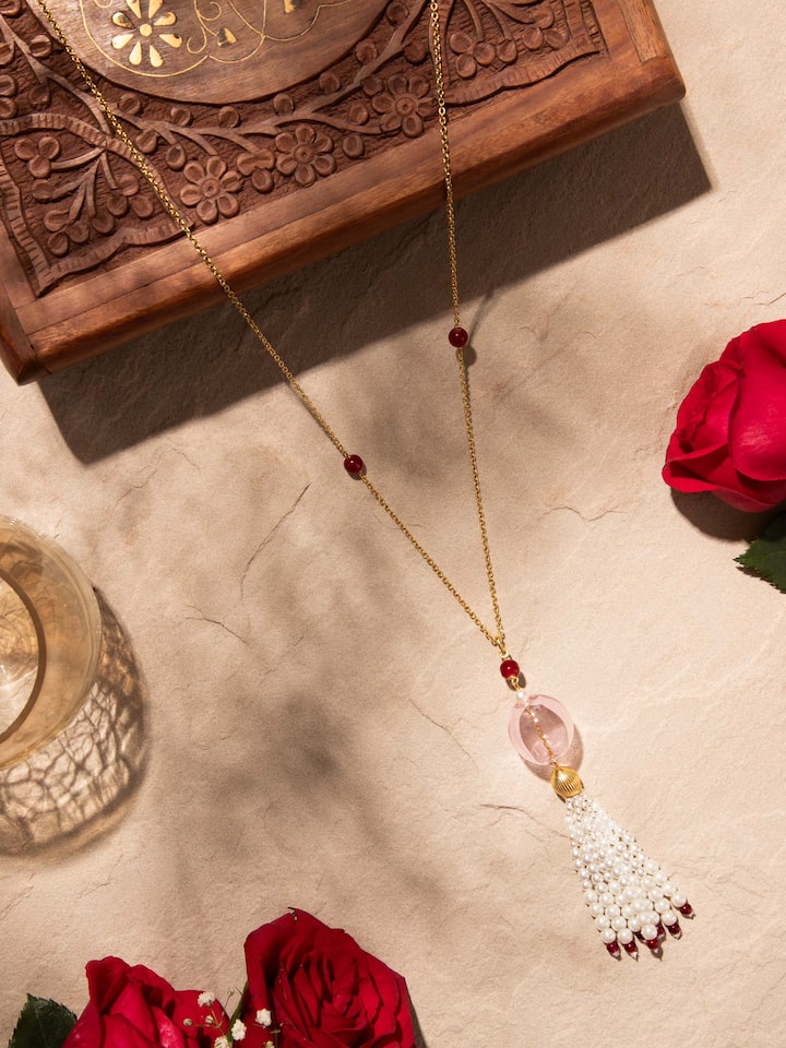 Angled view of Silver Flame Glass Long Necklace showcasing the intricate glass beads and silver accents by Swadesh