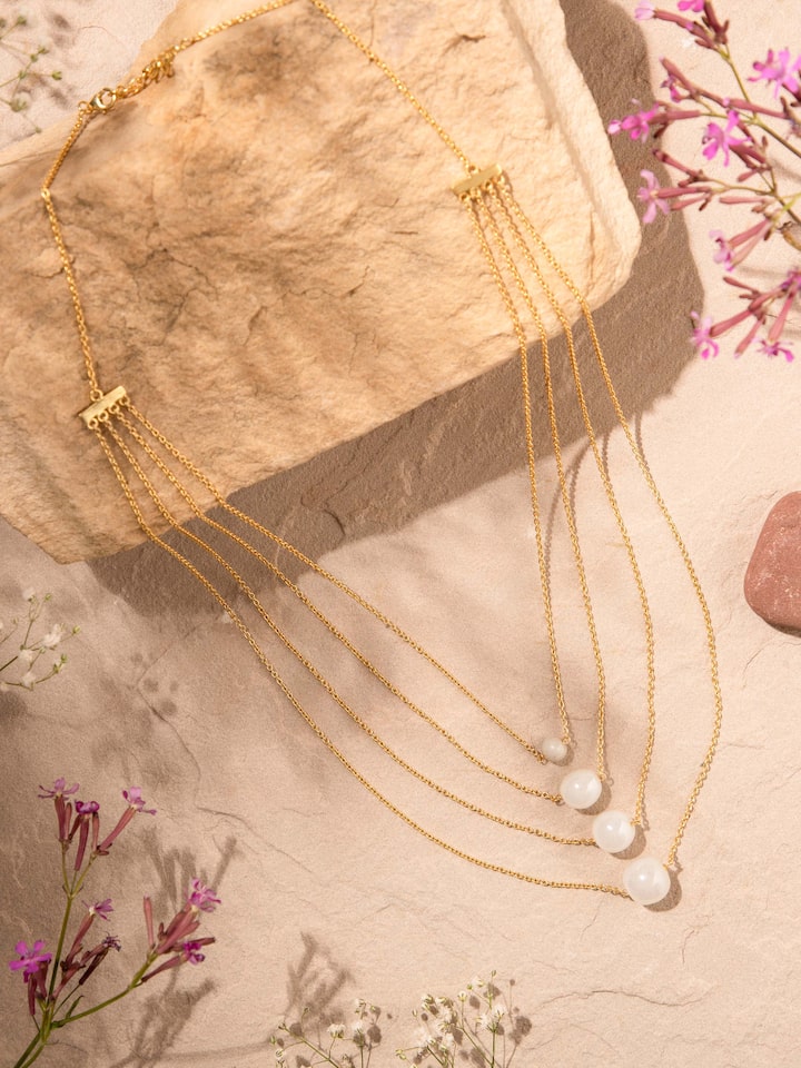 Side view of Silver Flame Glass Long Necklace showcasing the elegant glass and silver design by Swadesh