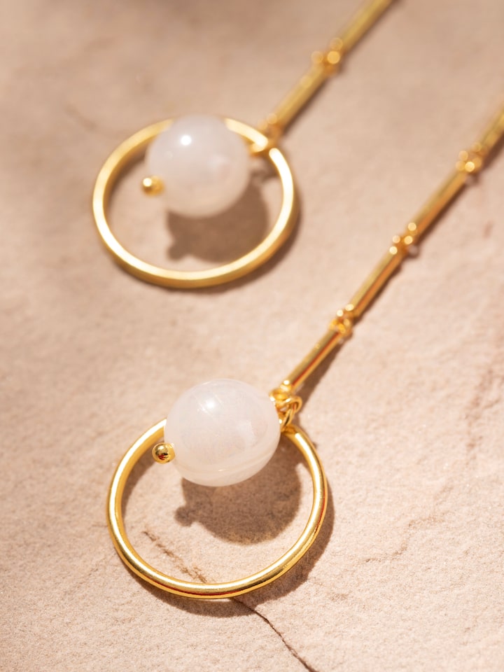 Detailed view of Silver Flame Glass Drop Earrings focusing on glass and silver craftsmanship.