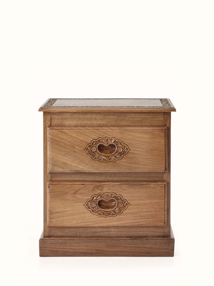 Front view of the carved walnut wood bedside table, highlighting the intricate detailing and rich finish