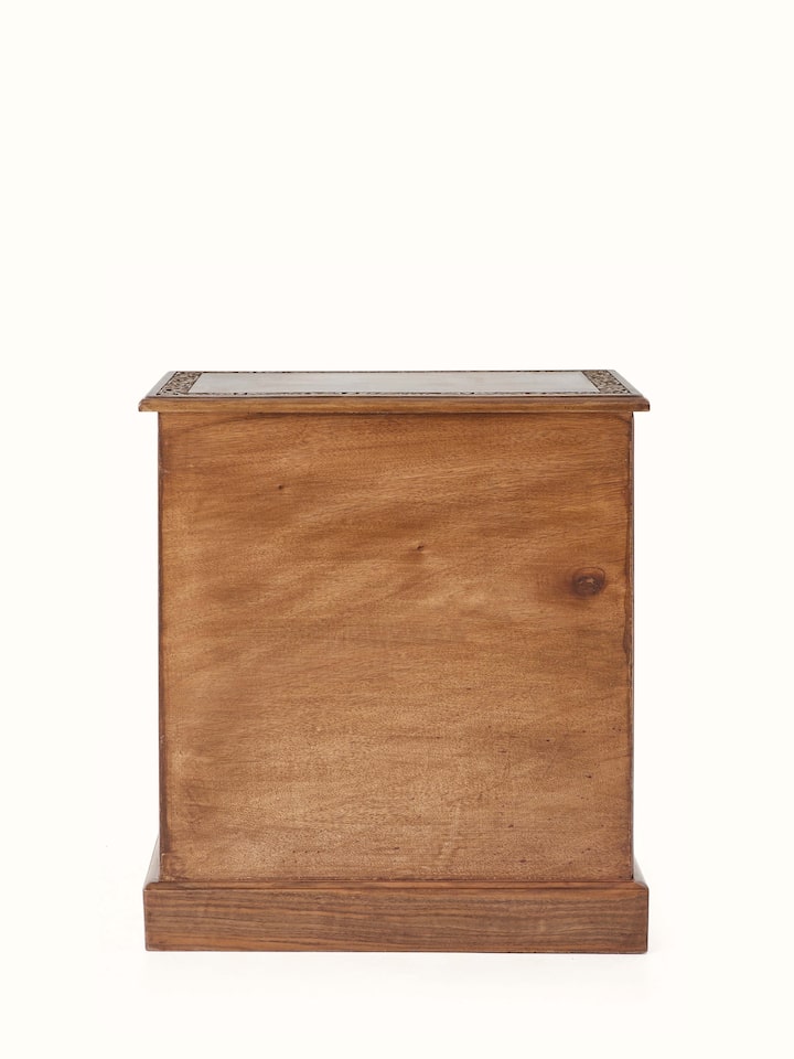 Front and side view of the carved walnut wood bedside table, highlighting the elegant design and functional features