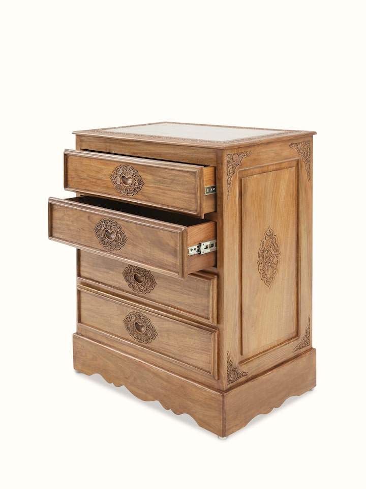 View of the carved patterns and drawer handles on Carved Walnut Wood Drawer Chest