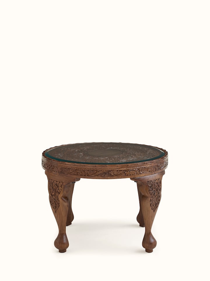 Front view of Carved Walnut Wood Round Coffee Table with Glass Top showing the front design and silhouette