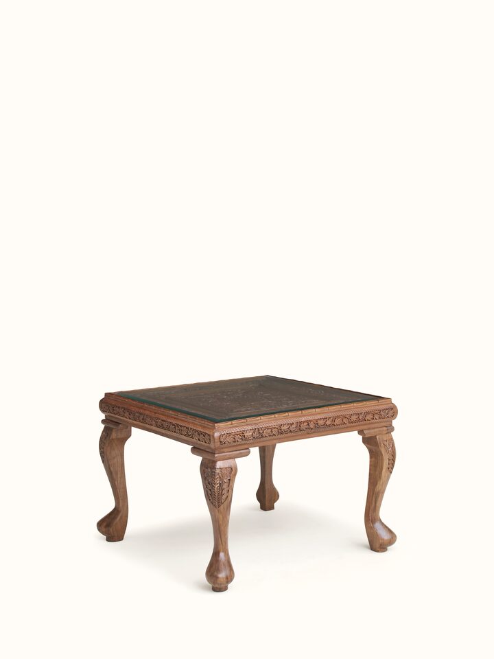 Close-up view of Carved Walnut Wood Square Coffee Table with Glass Top highlighting the inlay work and craftsmanship detail