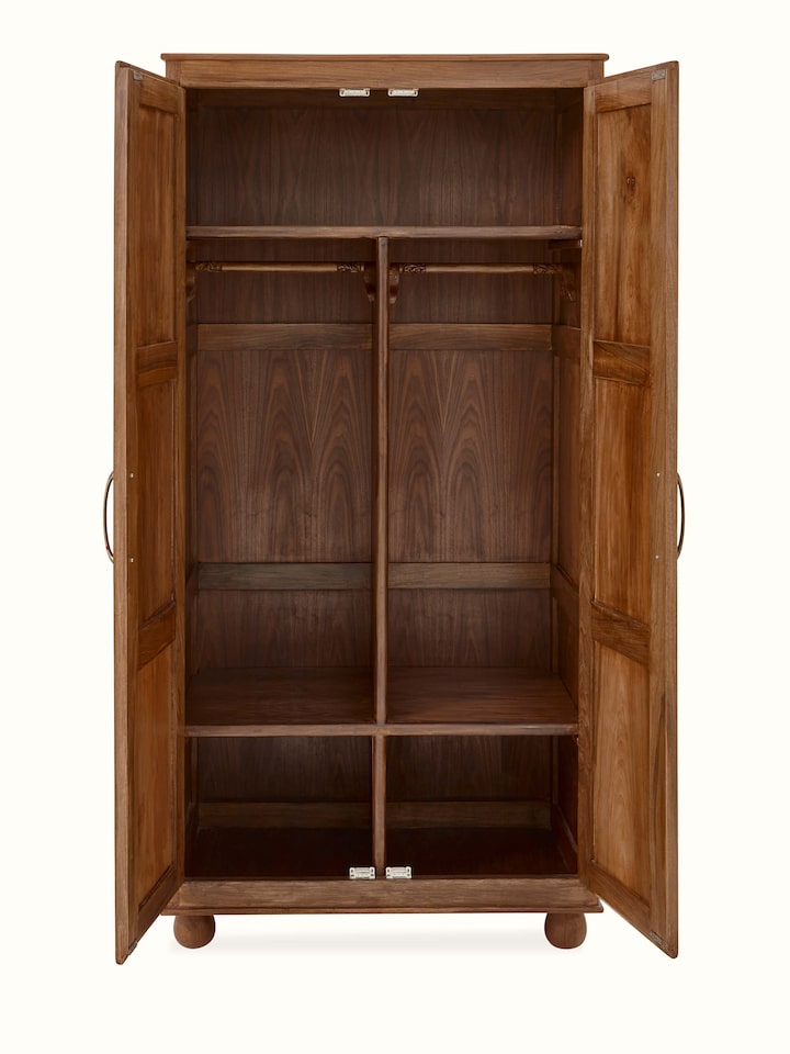 Another angle of carved walnut wood wardrobe, showing the side panels and intricate carving details